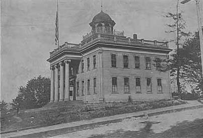 Territorial University on opening day, showing south and west sides of main building, November 4, 1861