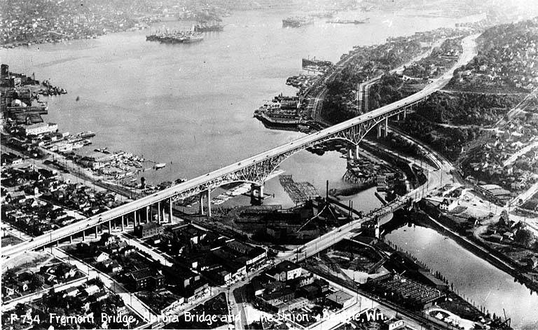 Lake Union, Lake Washington Ship Canal, the Fremont Bridge, and the George Washington Memorial Bridge (Aurora Bridge), Seattle, Washington, circa 1932, from https://flickr.com/photos/uw_digital_images/4860576629/