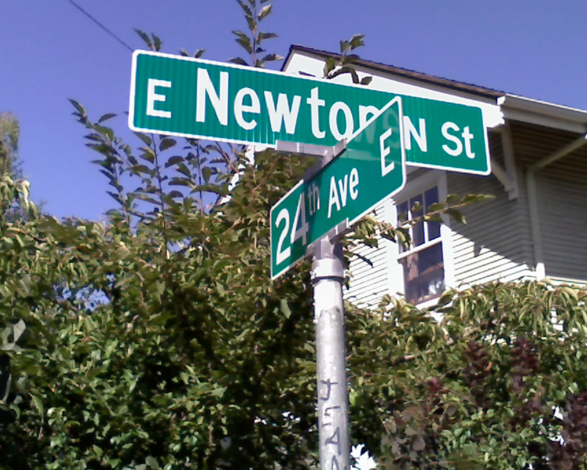 Sign reading “E Newton N St”, corner of E Newton Street and 24th Avenue E, August 2009