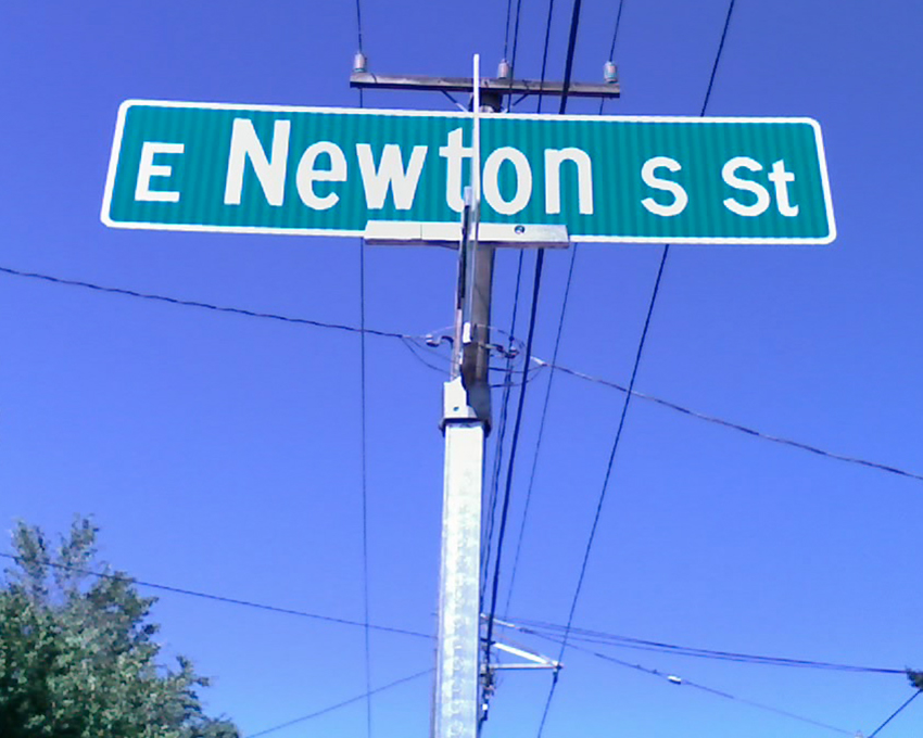 Sign reading “E Newton S St”, corner of E Newton Street and 24th Avenue E, August 2009