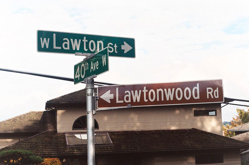 Street sign at the corner of Lawtonwood Road, W Lawton Street, and 40th Avenue W, October 30, 2011