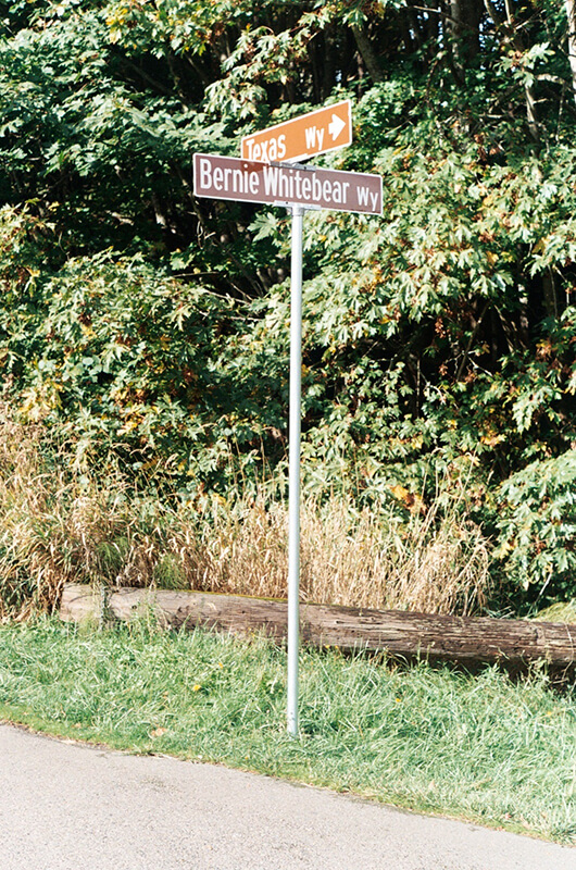 Signs at corner of Texas Way and Bernie Whitebear Way, October 30, 2011