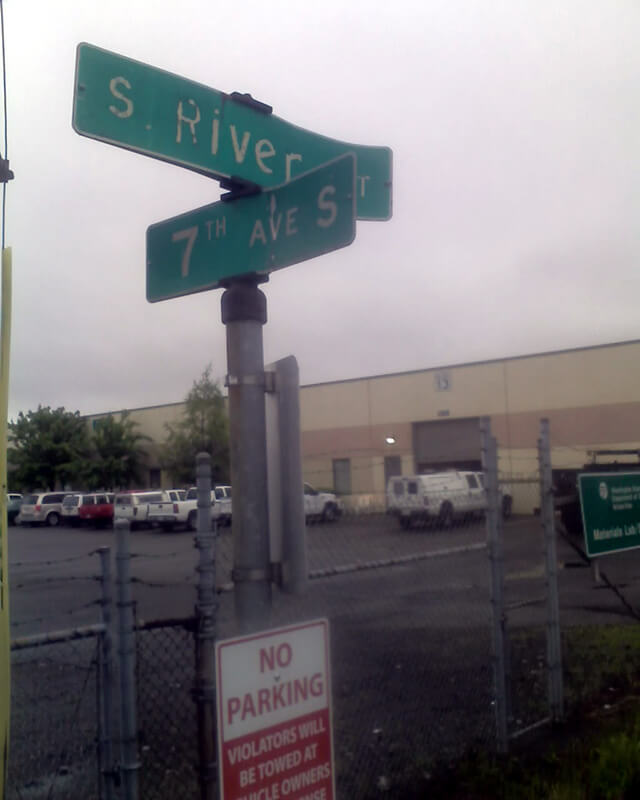 Sign at corner of S River Street and 7th Avenue S, May 22, 2013