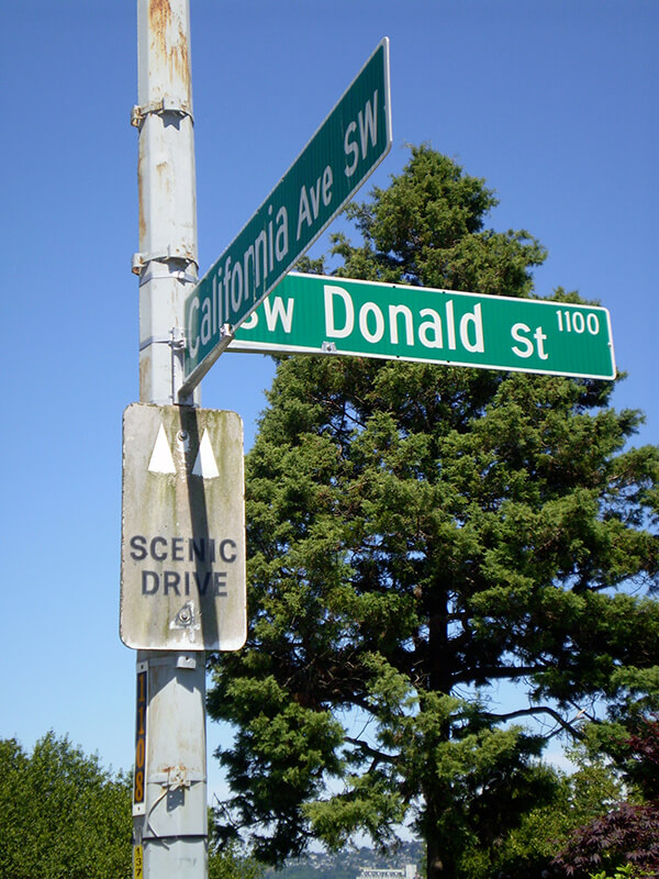 Sign at corner of SW Donald Street and California Avenue SW, July 4, 2011