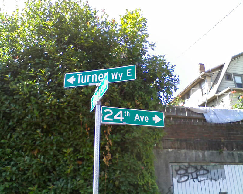 Street sign at corner of Turner Way E, E Helen Street, and 24th Avenue E, August 24, 2009