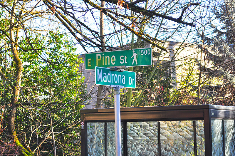 Street sign at corner of Madrona Drive and E Pike Street